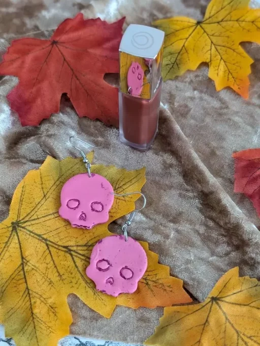 boucles d'oreilles tête de mort rose